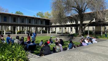 Students gather in the courtyard for a spring event