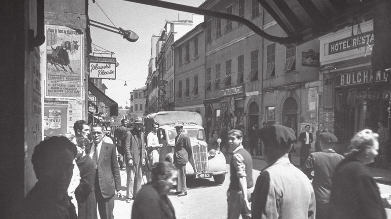 Main street in Gibralter during the 1940s. Black and white photo.