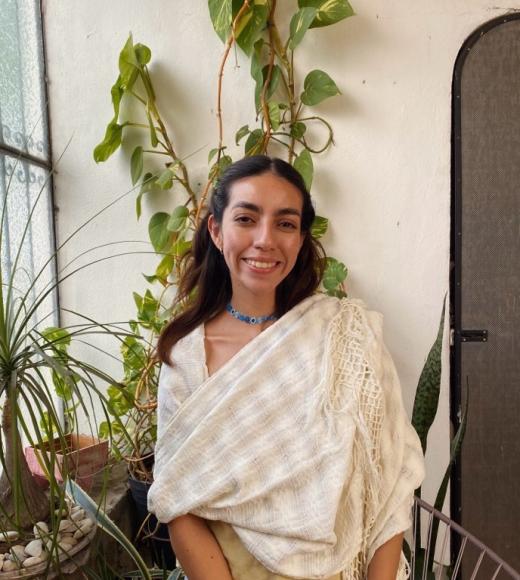woman in front of plants