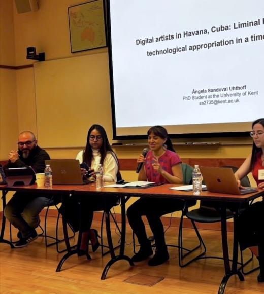 panel of graduate students at conference
