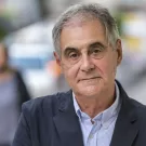 A photo of a man with short gray hair.