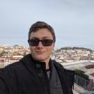 man in front of cityscape.